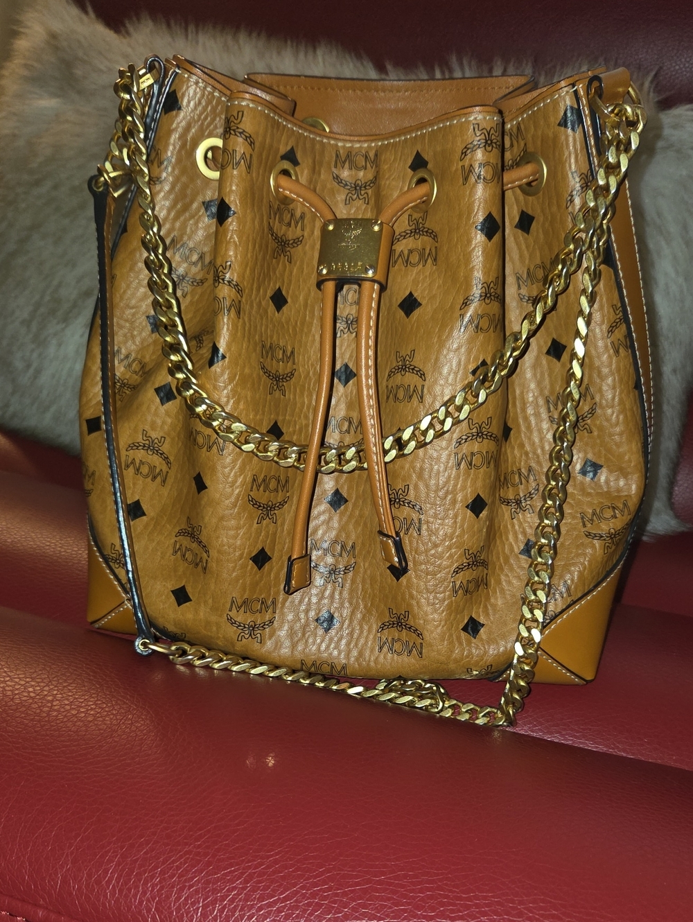 MCM Cognac Visetos Drawstring Bucket Bag with Gold Chain Strap